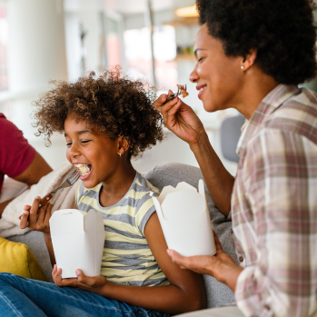 family eating leftovers