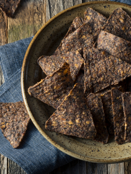 A bowl of homemade blue tortilla chips