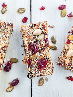 A group of granola bars with seeds and nuts