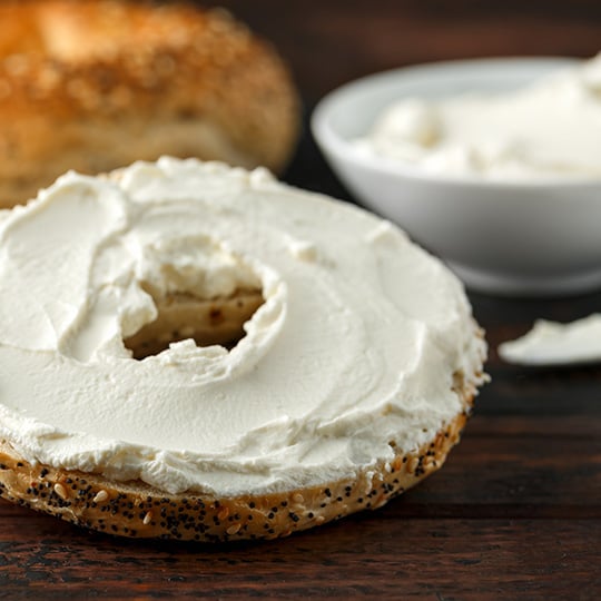 Bagel with cream cheese spread